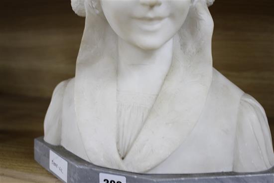 An early 20th century North European carved alabaster bust of a Flemish girl wearing a lace bonnet, unsigned, on grey marble plinth, he